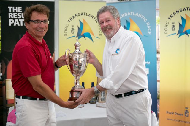 RORC Admiral Andrew McIrvine Presents Jean-Paul Riviere with the IMA Trophy Photo: RORC / Arthur Daniel