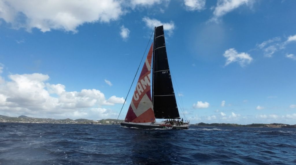 Volvo 70 HYPR heads for the finish line off Camper & Nicholsons Port Louis Marina and completes the RORC Transatlantic Race in an elapsed time of 12 days 8 hrs 29 mins and 48 secs © Louay Habib/RORC