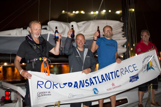 The crew of Mike Gascoyne's Class 40 Silvi Belle 2 celebrate completing the RORC Transatlantic Race 2015 Photo: RORC / Arthur Daniel