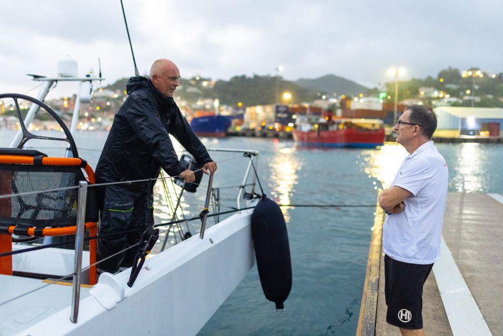 Bouwe Bekking discusses the race with Will Oxley (Comanche) © Arthur Daniel/RORC