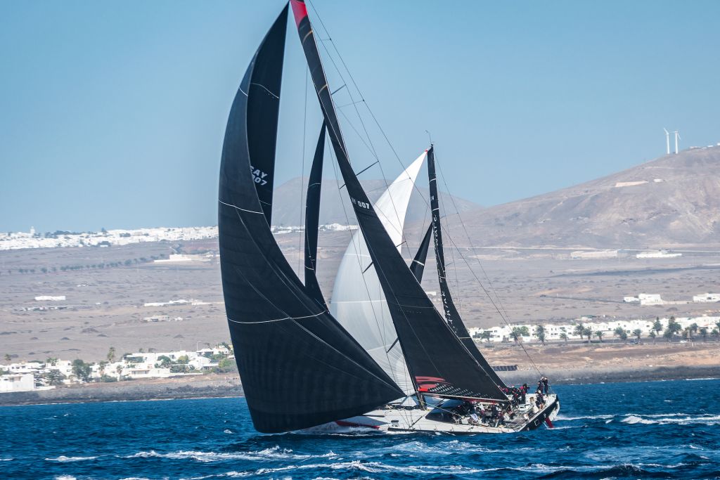 Maxi Comanche (RUS) skippered by Mitch Booth is achieving over 20 knots of boat speed hour after hour on the second day of the RORC Transatlantic Race where tactics split the fleet © Lanzarote Photo Sport