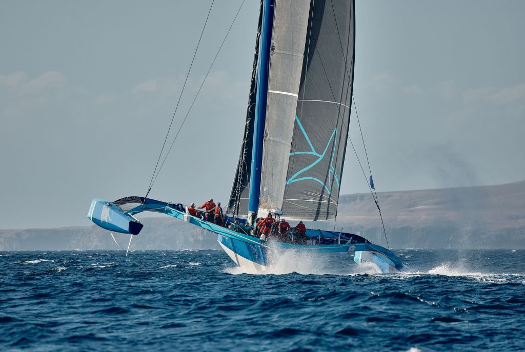 Peter Cunningham's MOD70 PowerPlay (CAY) hit speeds of 33 knots at the start of the RORC Transatlantic Race when 30 boats took to the start off Marina Lanzarote for the 3,000nm race to Grenada © RORC/James Mitchell 